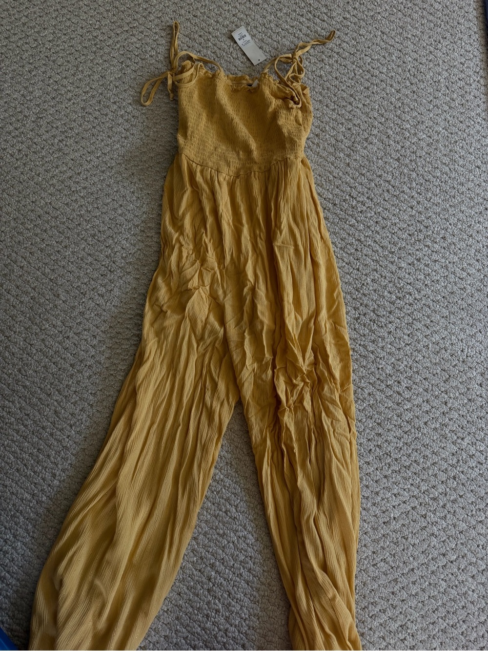 Francesca’s Mustard Smocked Bodice Wide-Leg Jumpsuit